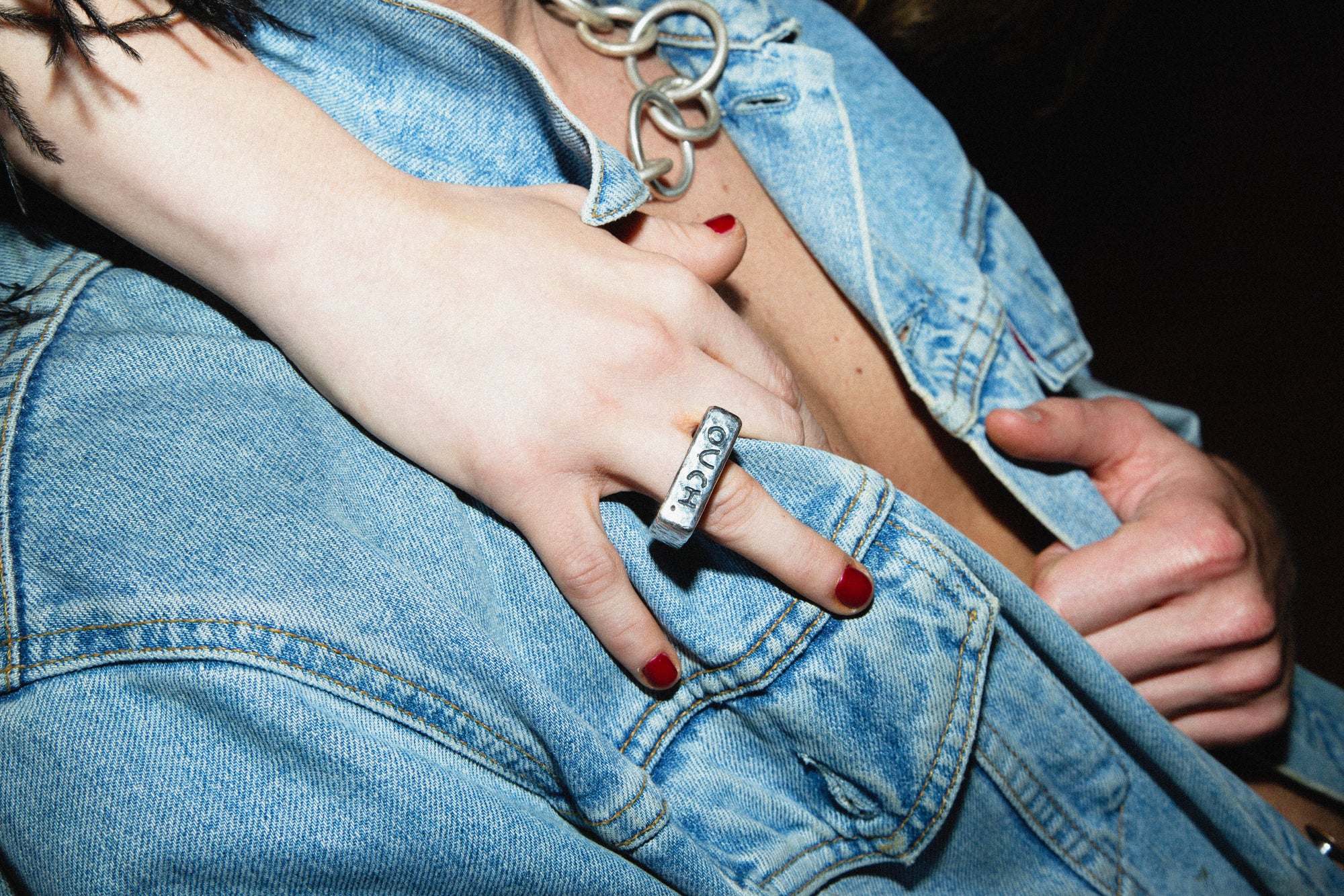 OUCH. ring worn, displaying embrace of flaws and authentic beauty