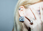 ORBIS hand-carved 925 sterling silver earrings with striking observation design