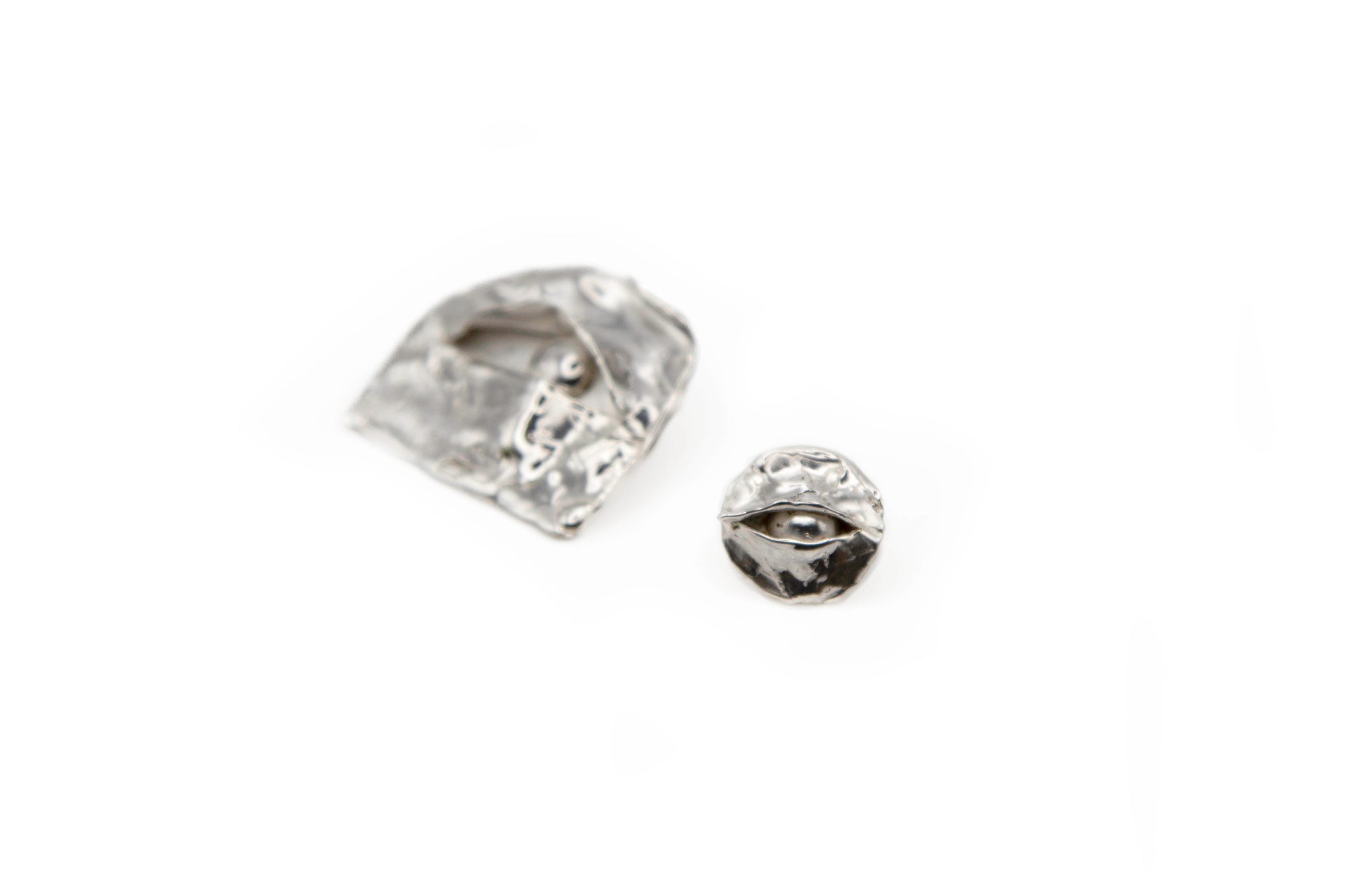 ORBIS hand-carved 925 sterling silver earrings with striking observation design