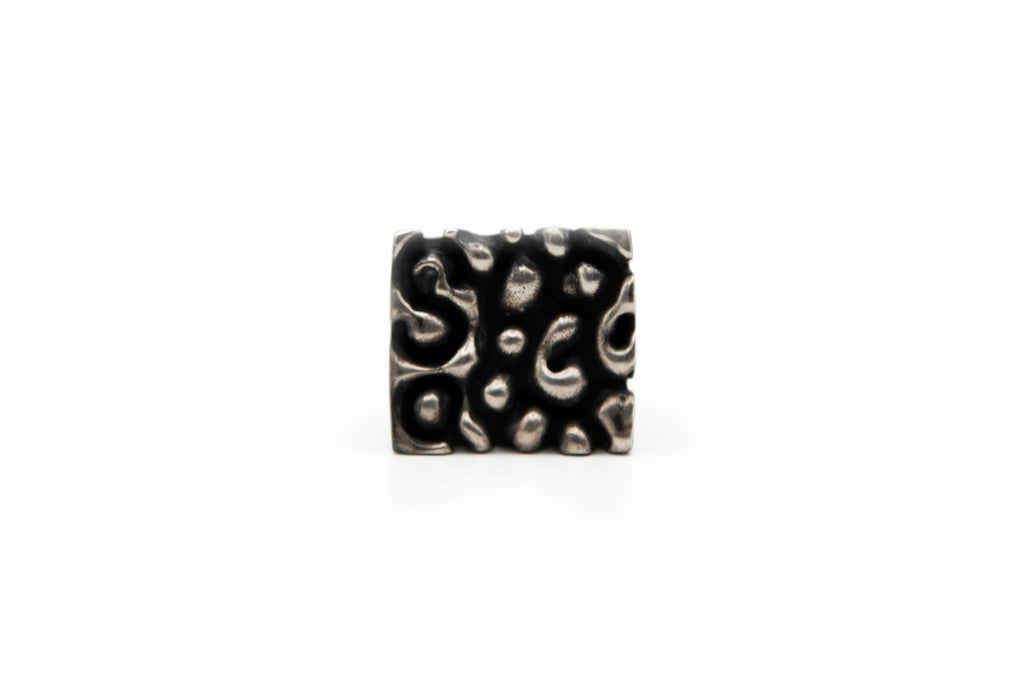 "MYRIA hand-carved sterling silver ring with unique geometrical design