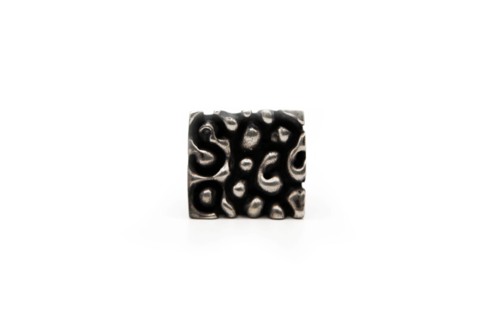 "MYRIA hand-carved sterling silver ring with unique geometrical design