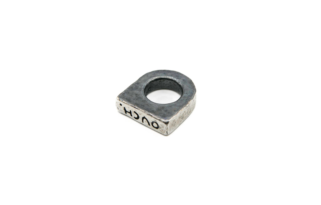 Close-up of OUCH. ring showing beauty of imperfection and unique character