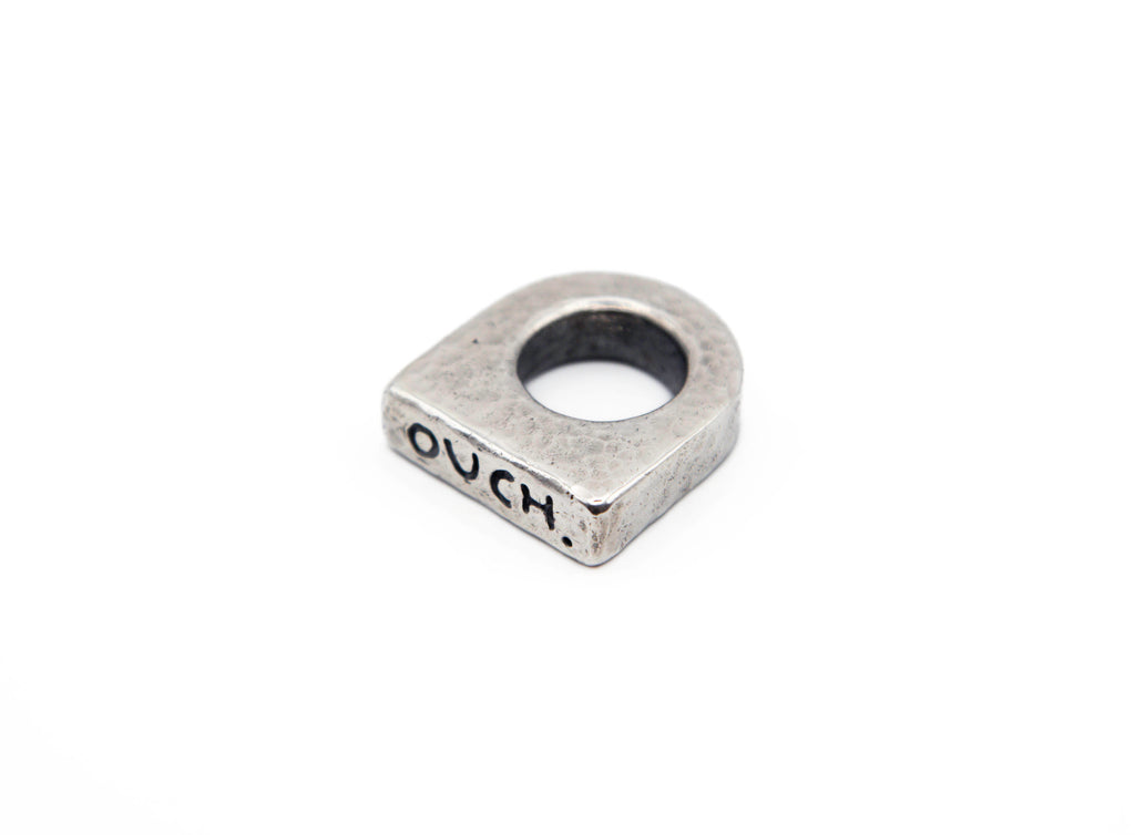 Close-up of OUCH. ring showing beauty of imperfection and unique character