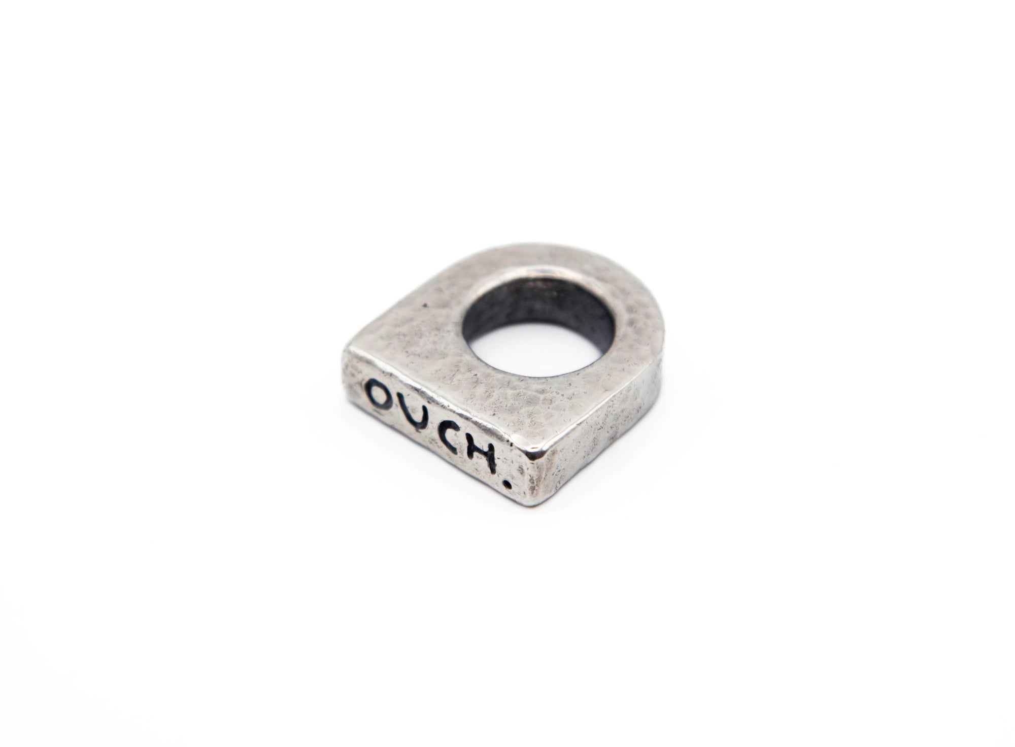 Close-up of OUCH. ring showing beauty of imperfection and unique character