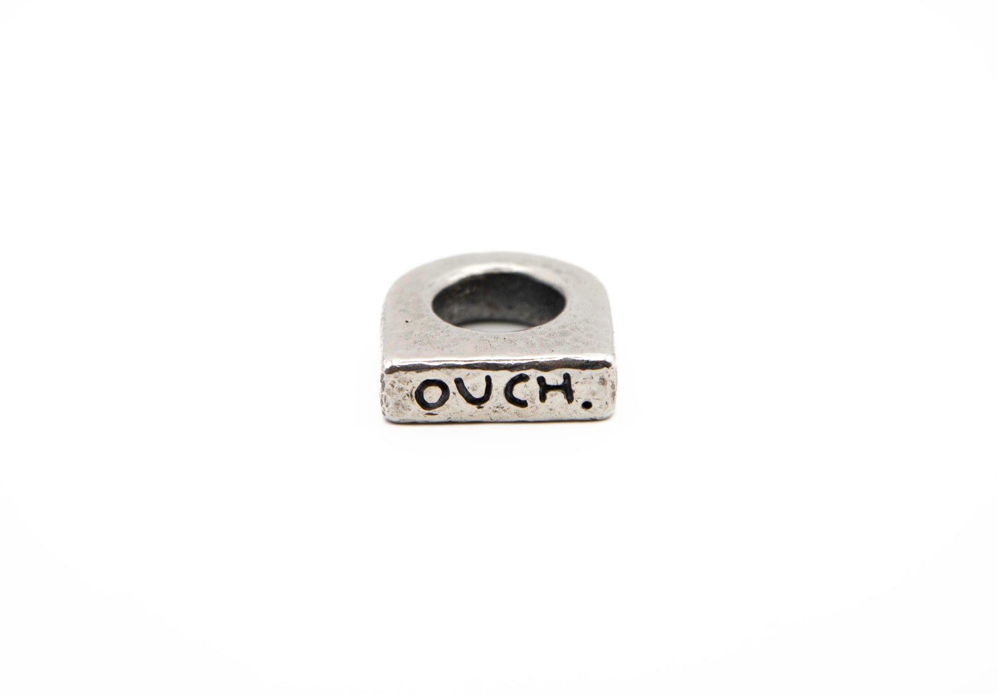 OUCH. hand-carved sterling silver ring celebrating imperfection and flaws