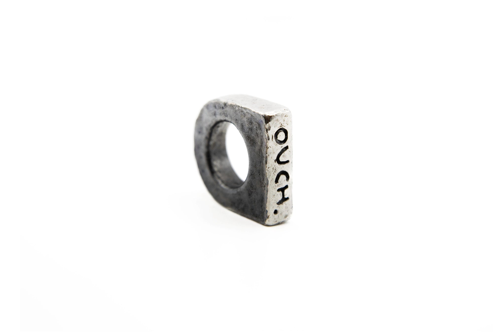 OUCH. hand-carved sterling silver ring celebrating imperfection and flaws