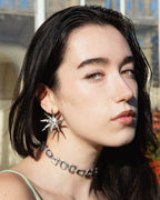THE PORTAL CHOKER showing abstract interconnected shapes and central openings