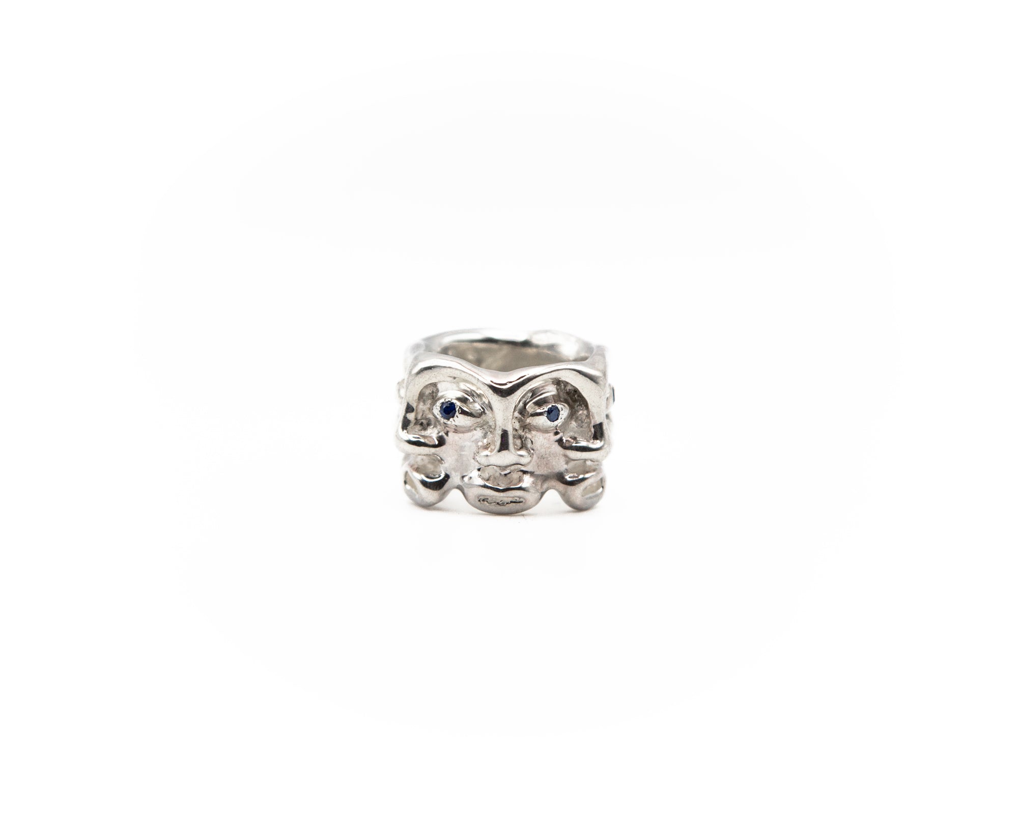 Hand-carved 925 ct sterling silver ring + blue zircons featuring comedian faces.