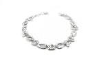 THE PORTAL CHOKER showing abstract interconnected shapes and central openings