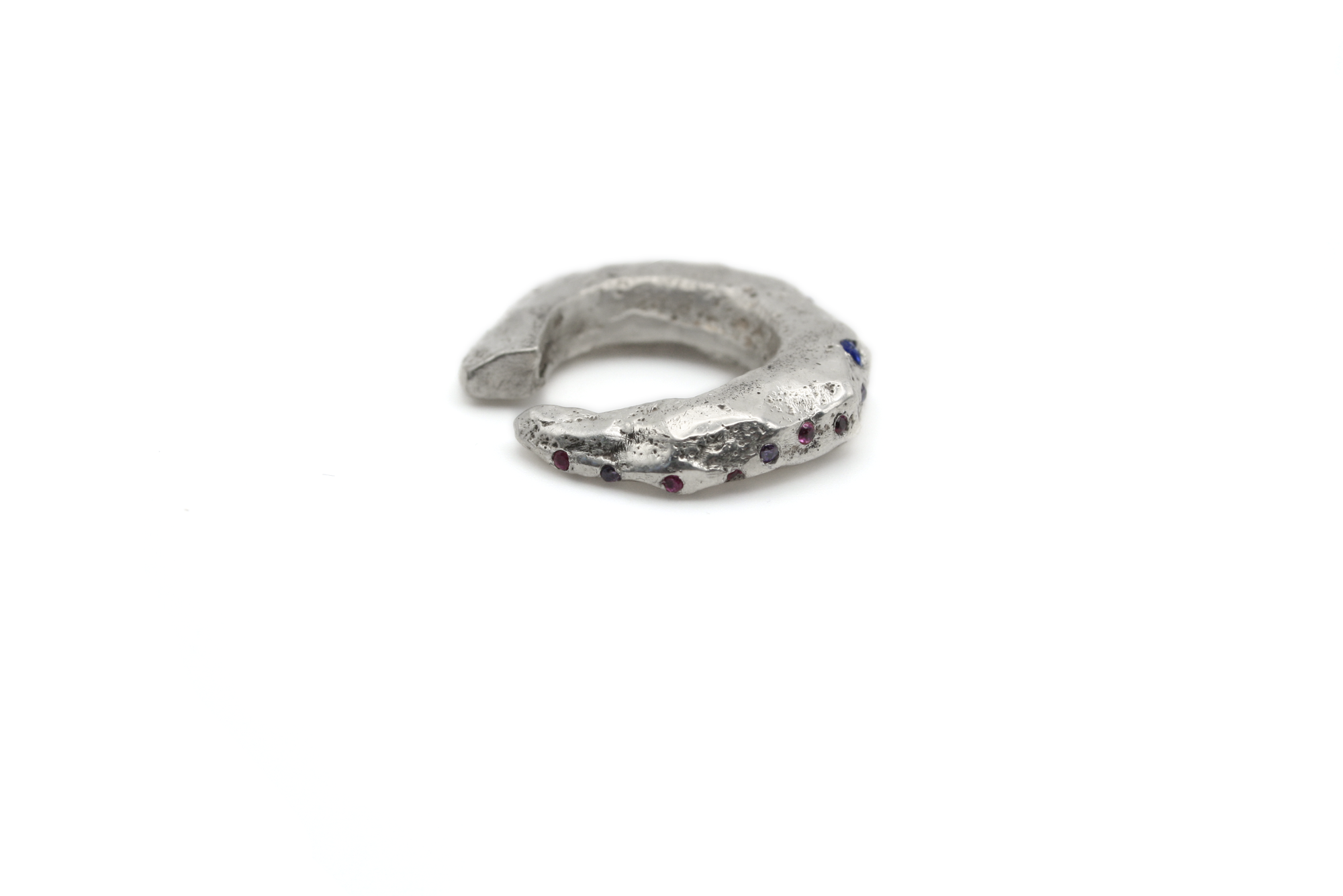 Detail shot of VAN GOGH ear cuff's sand casted sterling silver 