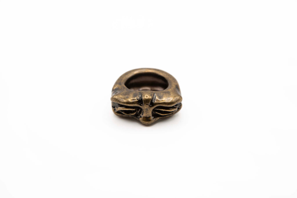 OMO hand-carved 24K gold-plated brass ring with timeless face design