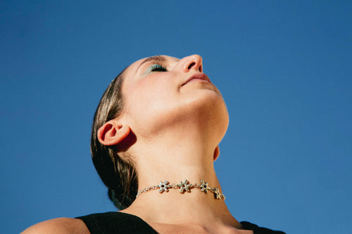 BLOOM BLOOM choker worn, displaying nature-inspired Art Nouveau styling